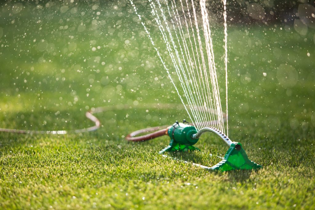 water sprinkler - lawn care services cincinnati
